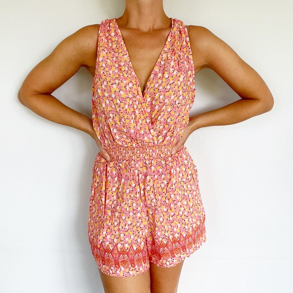 BeBop pink yellow floral sleeveless surplice backless tassel romper size medium